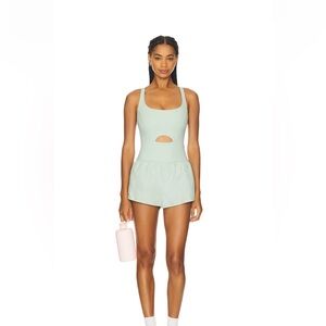 Free People Movement Righteous Runsie size medium in color turquoise!